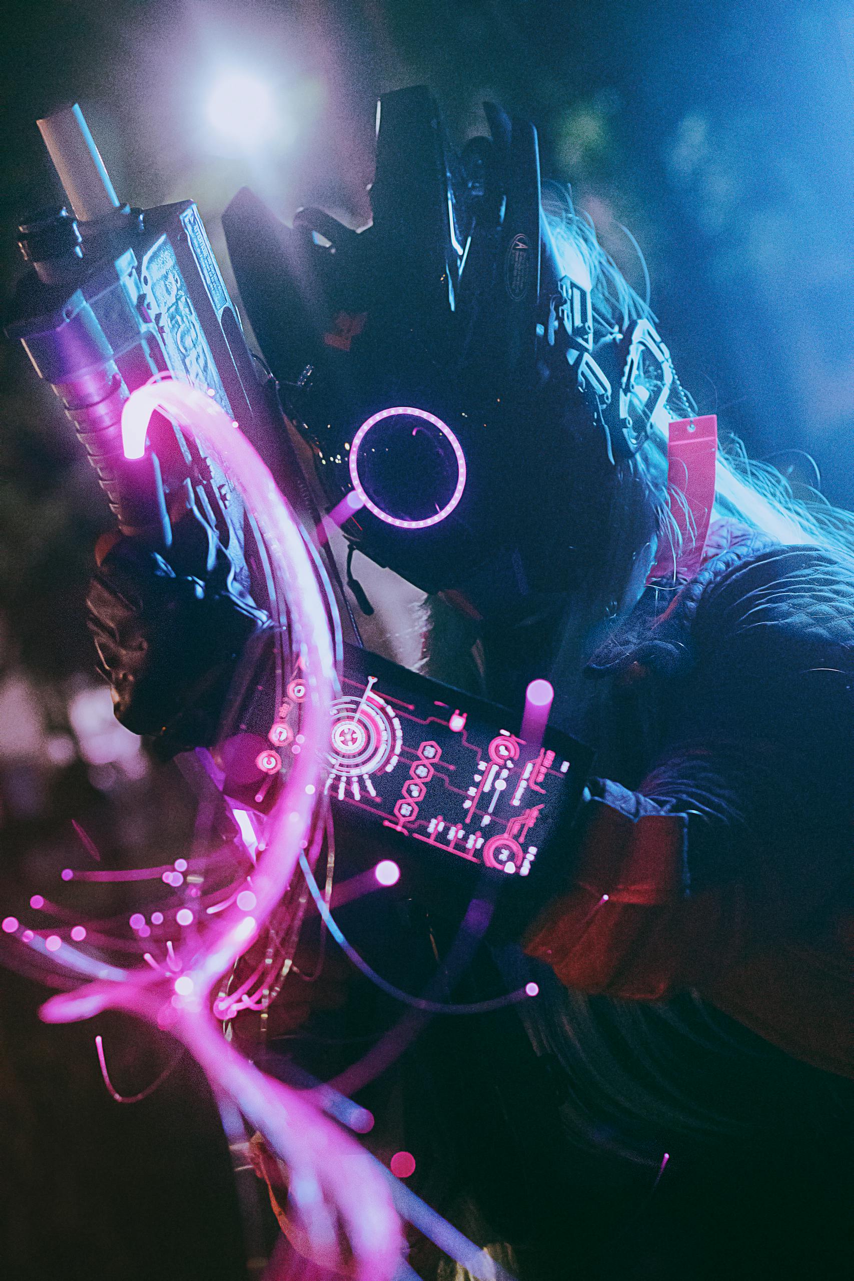 A cyberpunk warrior in futuristic armor glowing with holographic lights.