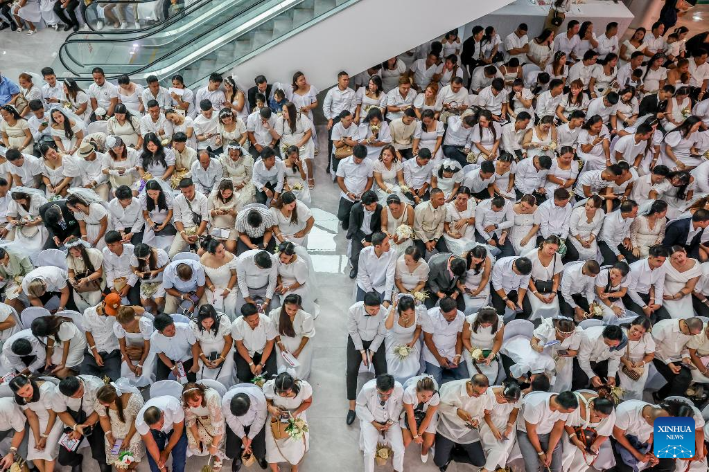 Brides and grooms attend a mass wedding ceremony in Quezon City, the Philippines, on Feb. 13, 2025. A total of 280 couples tied the knot in the annual event organized by the local government. (Xinhua/Rouelle Umali)